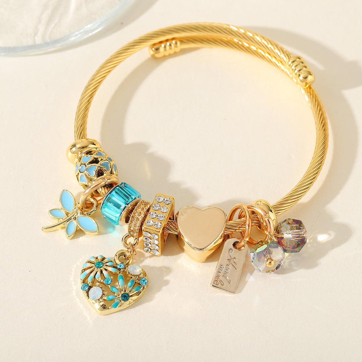 Gold Charm Bracelet with Heart and  Floral Details