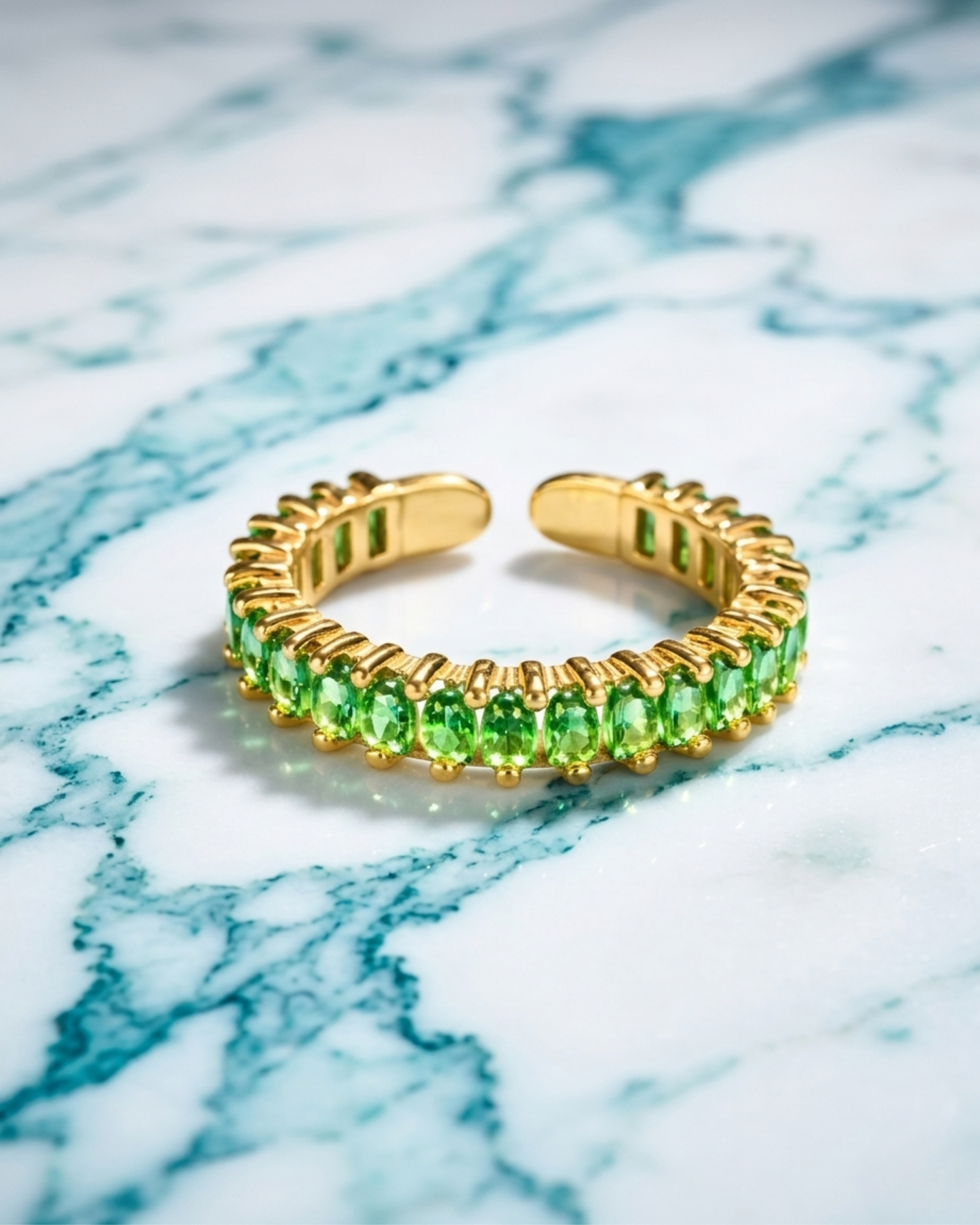 Gold Ring with Multiple Emeralds